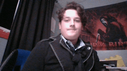 Man in Front of Happy Birthday Poster