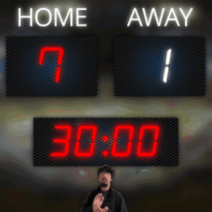 Man In Front Of Home And Away Scoreboard GIF