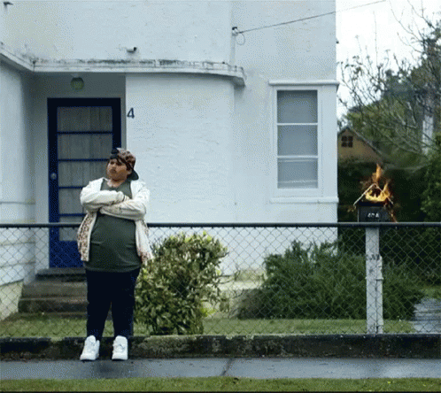 Man In Front Of House Number 4 GIF
