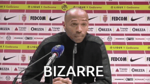 Man In Front Of Microphone With Bizarre GIF