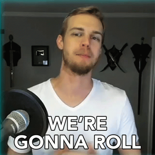 Man in Front of Microphone with Roll Shirt