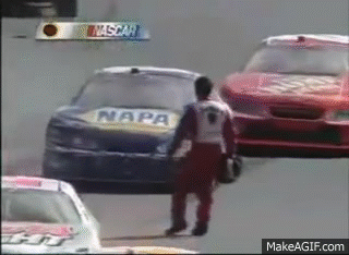 Man in Front of NASCAR Race Car