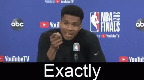 Man in Front of NBA Finals Sign