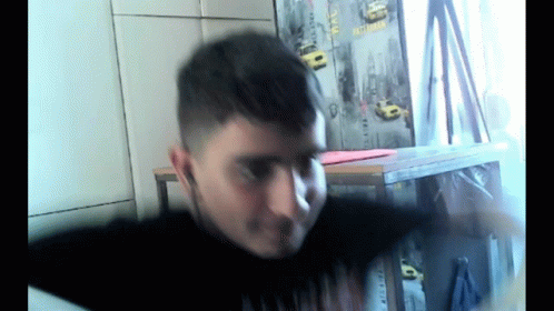 Man In Front Of New York City Wall GIF