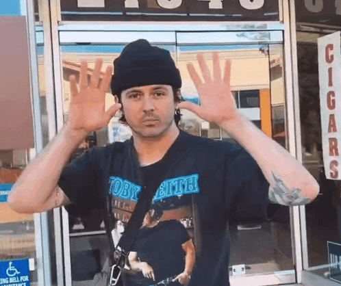 Man In Front Of Red Carpet Saying Los Cabos GIF