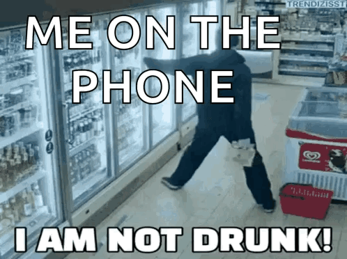 Man In Front Of Refrigerator Saying Me On The Phone I Am Not Drunk GIF