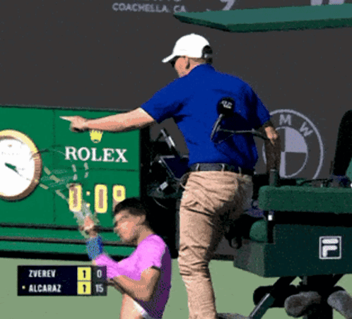 Man In Front Of Rolex Advertisement GIF