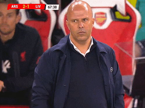 Man in Front of Scoreboard Ars 2-1 Liv 67 38