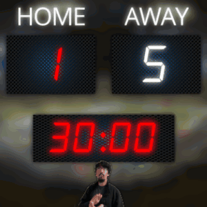 Man in Front of Scoreboard Home 15 Away 11:52