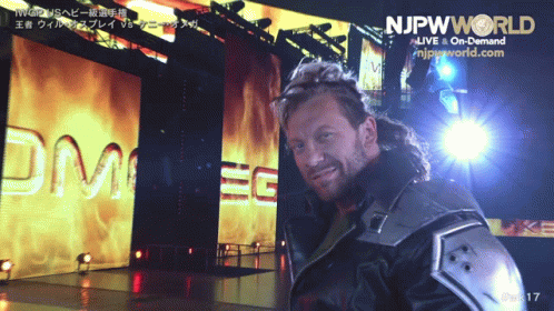 Man in Front of Screen Saying njpwworld