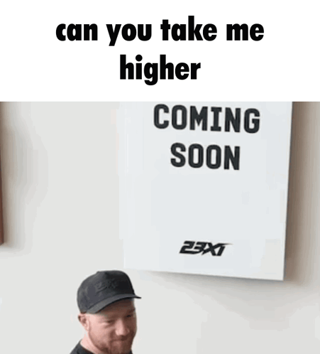 Man In Front Of Sign Saying Can You Take Me Higher Coming Soon GIF