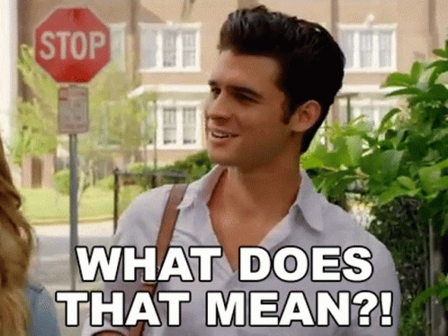 Man in Front of Stop Sign Saying What Does That Mean