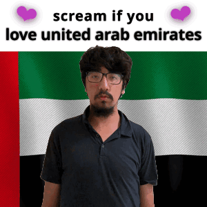 Man In Front Of United Arab Emirates Flag GIF