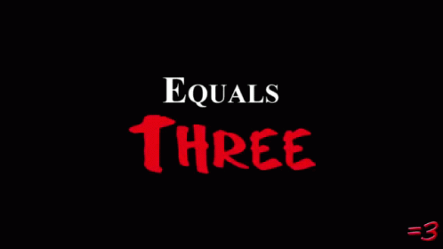 Man in Front of Wall Saying Equals Three
