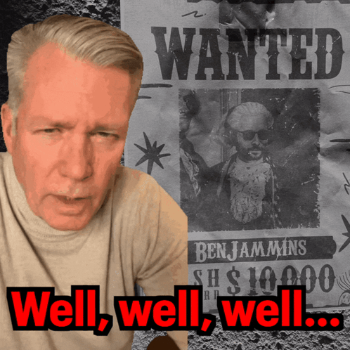 Man in Front of Wanted Poster Well Well Well