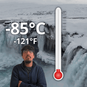 Man In Front Of Waterfall With Thermometer -85°F GIF