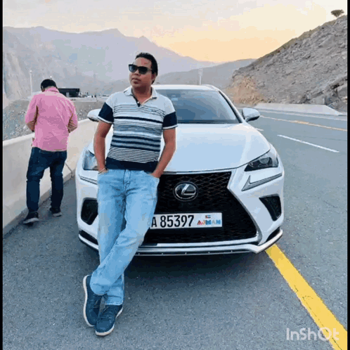 Man in Front of White Lexus With Plate A85397