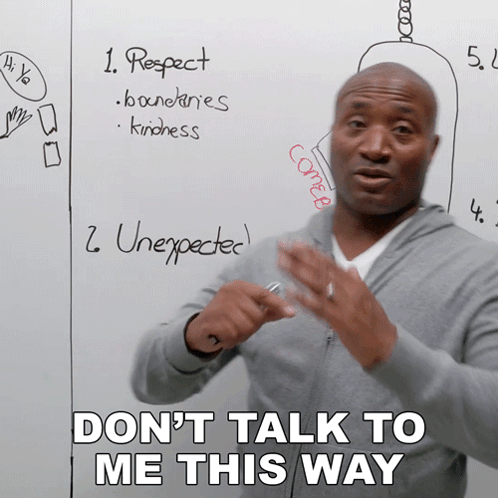 Man in Front of Whiteboard Saying Don't Talk to Me This Way