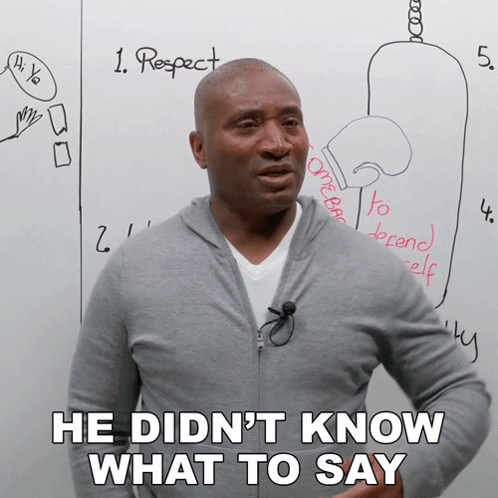 Man In Front Of Whiteboard Saying He Didn't Know What To Say GIF