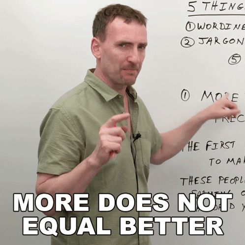 Man in Front of Whiteboard Saying More Does Not Equal Better