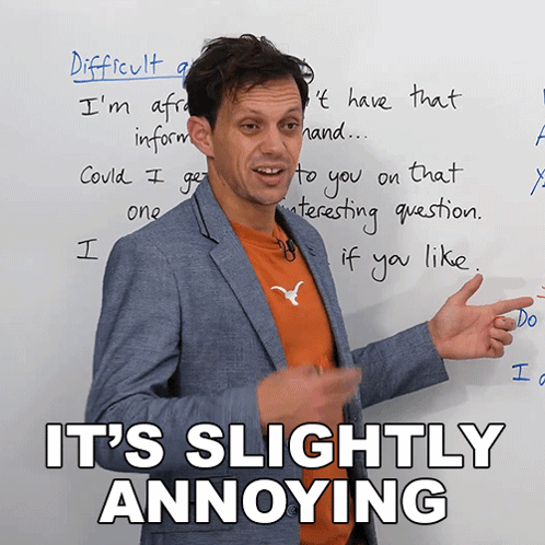 Man in Front of Whiteboard With It's Slightly Annoying