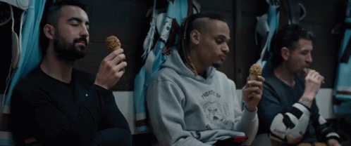 Man in Frosty Hoodie Eating Ice Cream