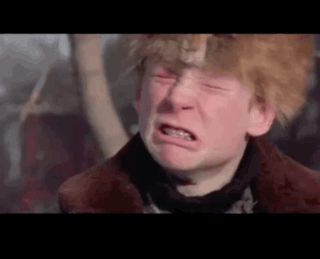 Man In Fur Coat And Hat Crying Eyes Closed GIF
