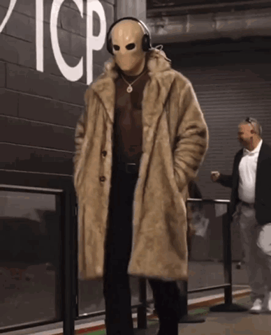 Man in Fur Coat and Mask