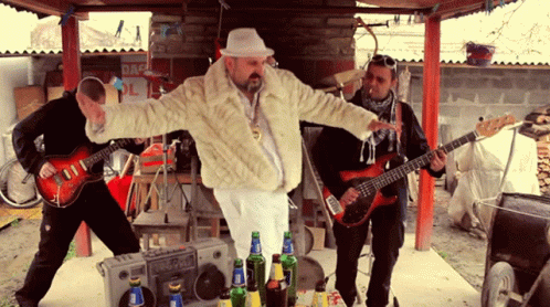 Man In Fur Coat At Danger Sign GIF
