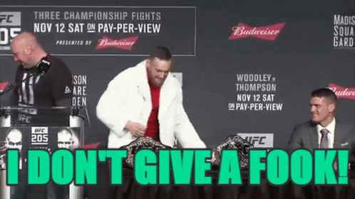 Man in Fur Coat Standing at Podium