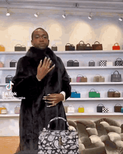 Man in Fur Coat Standing in Front of Handbags