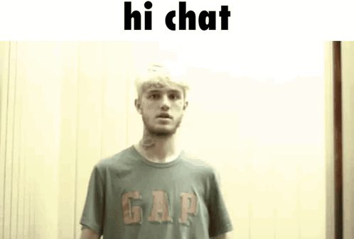 Man In Gap T-Shirt Standing In Front Of Wall GIF