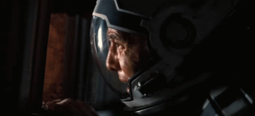Man In Gas Mask In Dark Room GIF