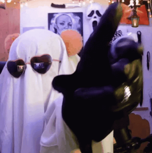 Man In Ghost Costume With Sunglasses On Head GIF