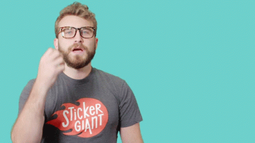 Man In Giant Sticker T-Shirt Holding Fist Up GIF