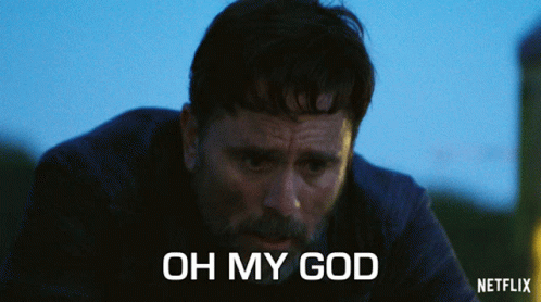 Man In Giant T-Shirt Holding Hammer GIF