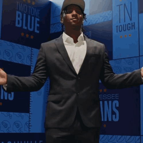 Man In Giants Jersey In Front Of City GIF