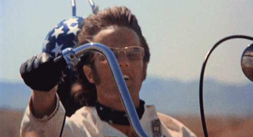 Man in Glasses and Bandana with Freedom
