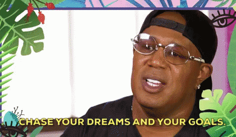 Man In Glasses And Baseball Cap Says Chase Your Dreams And Your Goals GIF