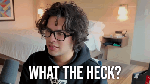 Man in Glasses and Black Hoodie Asking What the Heck
