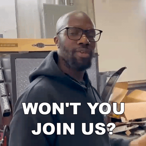 Man in Glasses and Black Hoodie Says Won't You Join Us