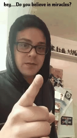 Man in Glasses and Black Hoodie Thumbs Up