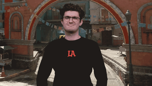 Man in Glasses and Black La Shirt