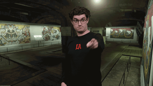 Man in Glasses and Black La Shirt