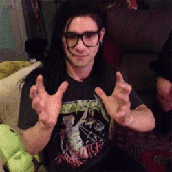 Man in Glasses and Black Metallica Shirt