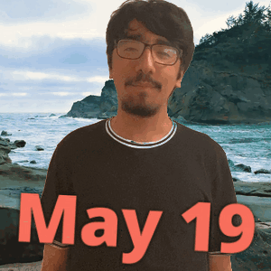 Man In Glasses And Black Shirt At Beach GIF