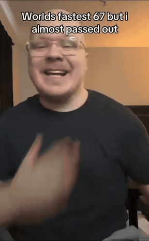 Man in Glasses and Black Shirt Saying Fastest