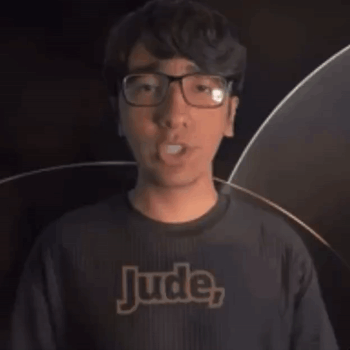 Man in Glasses and Black Shirt Saying Jude