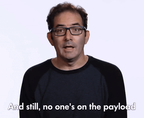 Man In Glasses And Black Shirt Says And Still No One's On The Payload GIF