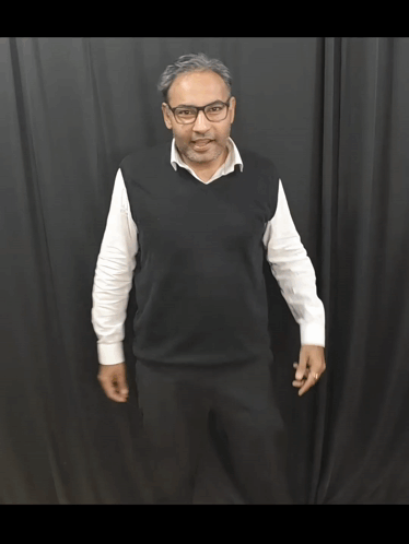 Man in Glasses and Black Vest